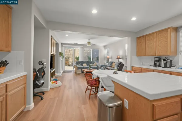 a kitchen with a sink a stove and a refrigerator
