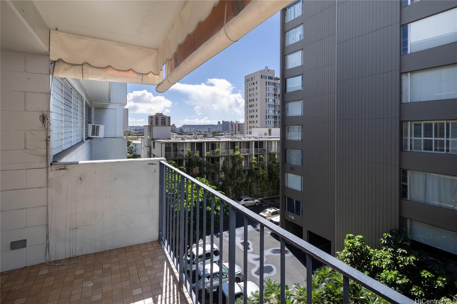 1615 Wilder Avenue, Unit 507 Honolulu, HI 96822 - Photo 16 of 20 a city view from a balcony