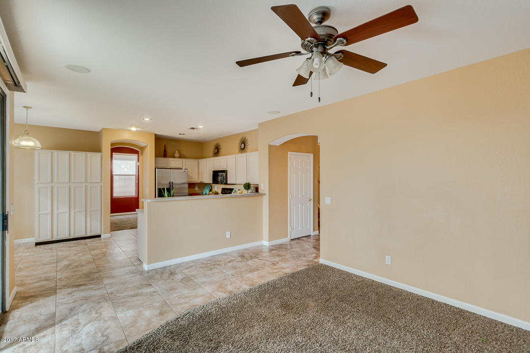 2803 West Lamar Road Phoenix, AZ 85017 - Photo 12 of 47 a view of a livingroom with a kitchen