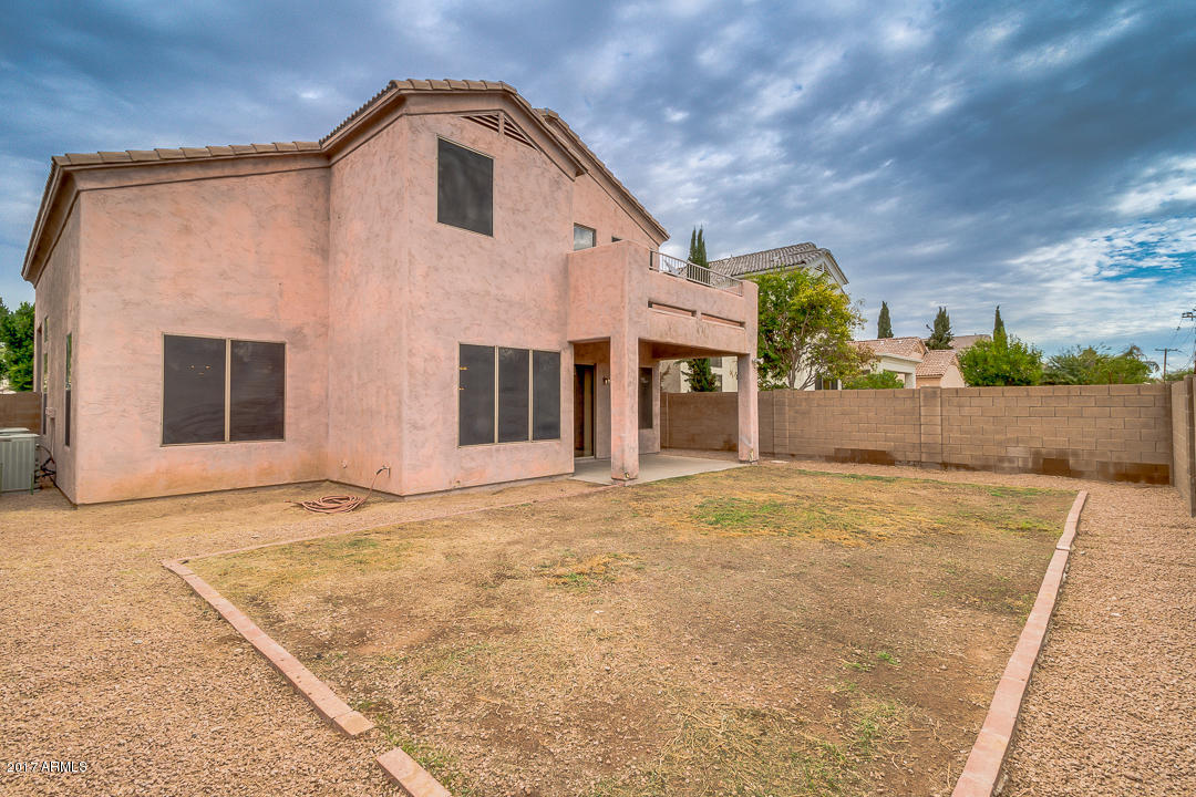 2803 West Lamar Road Phoenix, AZ 85017 - Photo 36 of 47 a front view of a house with a yard