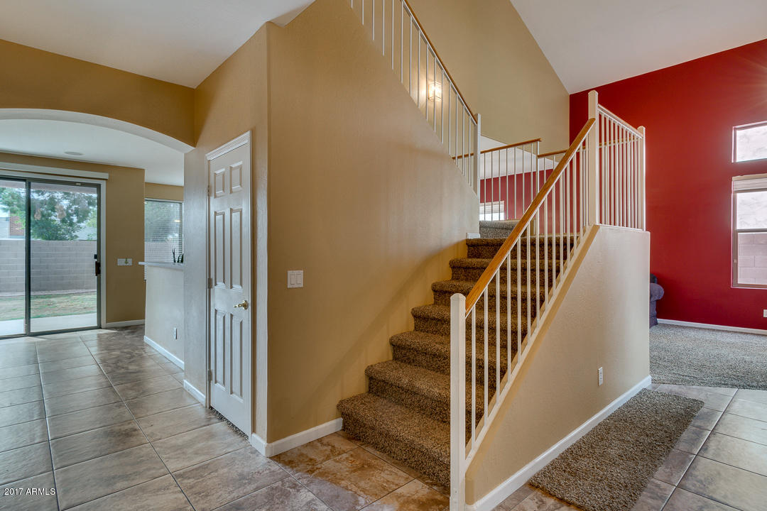2803 West Lamar Road Phoenix, AZ 85017 - Photo 8 of 47 a view of a hallway with staircase