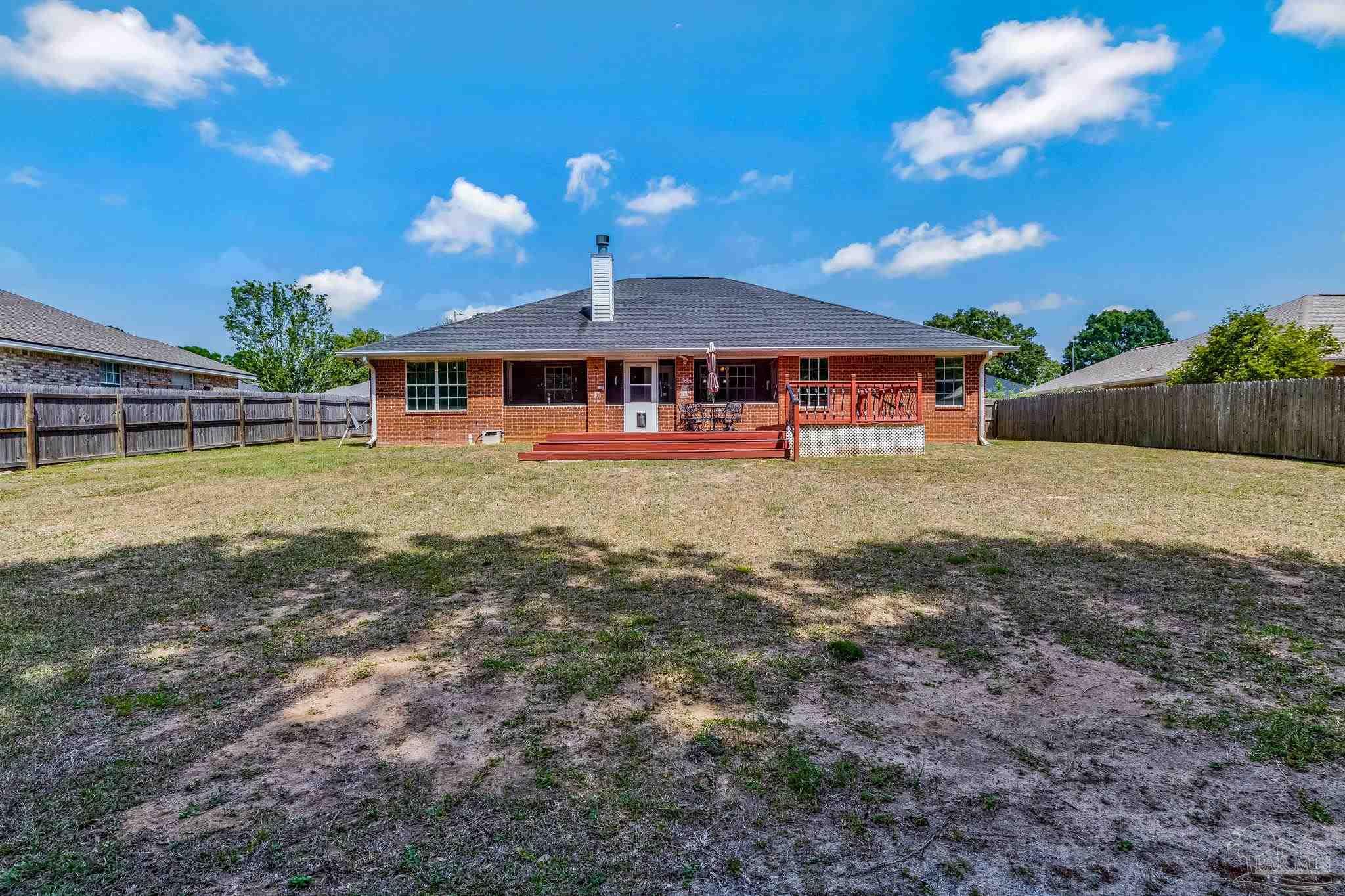 7121 Woodside Road Pensacola, FL 32526 - Photo 53 of 69 a view of a house with swimming pool