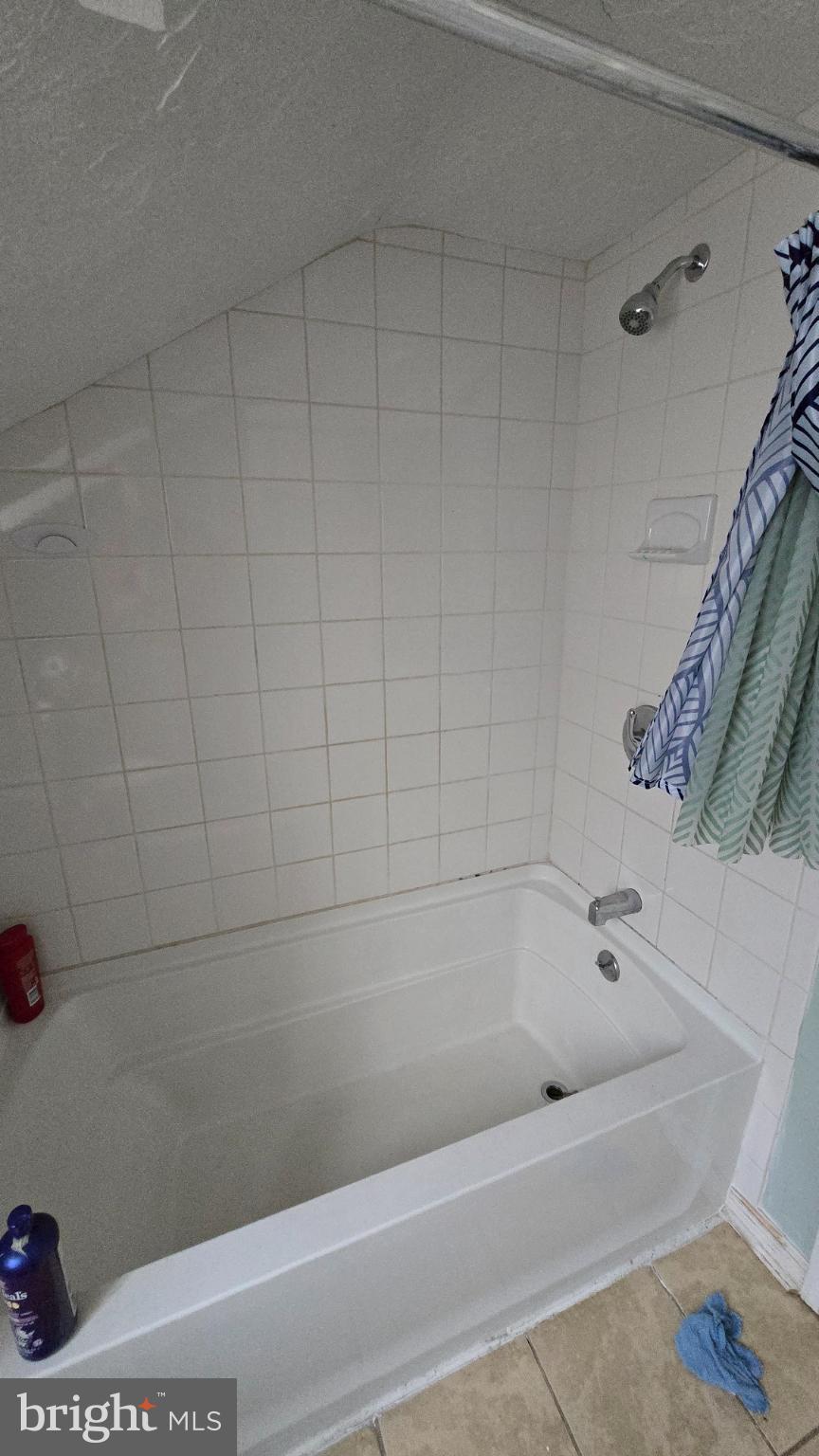 327 North Main Street York, PA 17403 - Photo 8 of 12 a bathroom with a bathtub