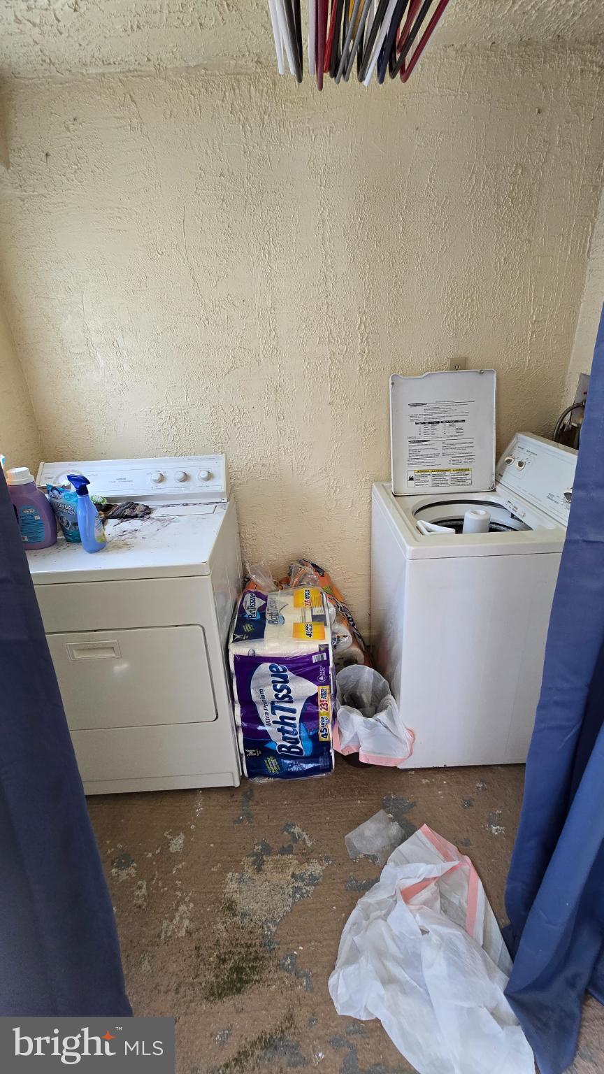 327 North Main Street York, PA 17403 - Photo 10 of 12 a utility room with dryer and washer