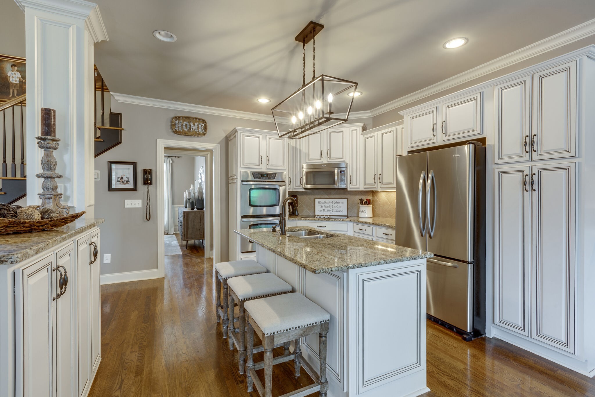 3012 Stewart Campbell Pointe Spring Hill, TN 37174 - Photo 12 of 44 a kitchen with granite countertop a refrigerator and microwave