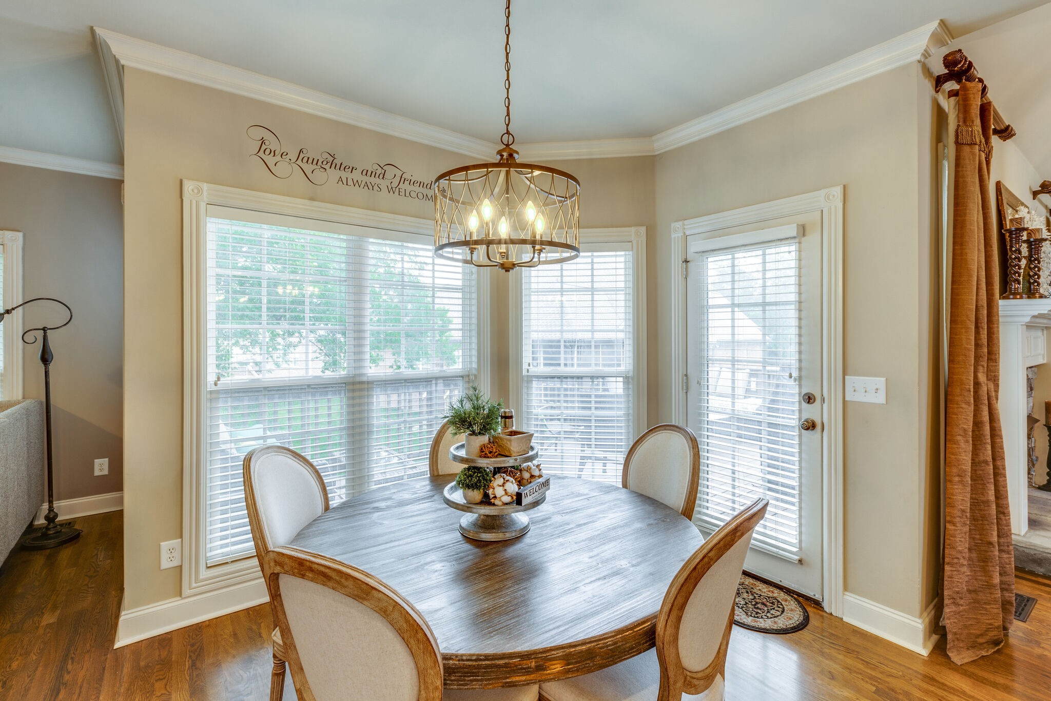 3012 Stewart Campbell Pointe Spring Hill, TN 37174 - Photo 17 of 44 a dining room with furniture and wooden floor