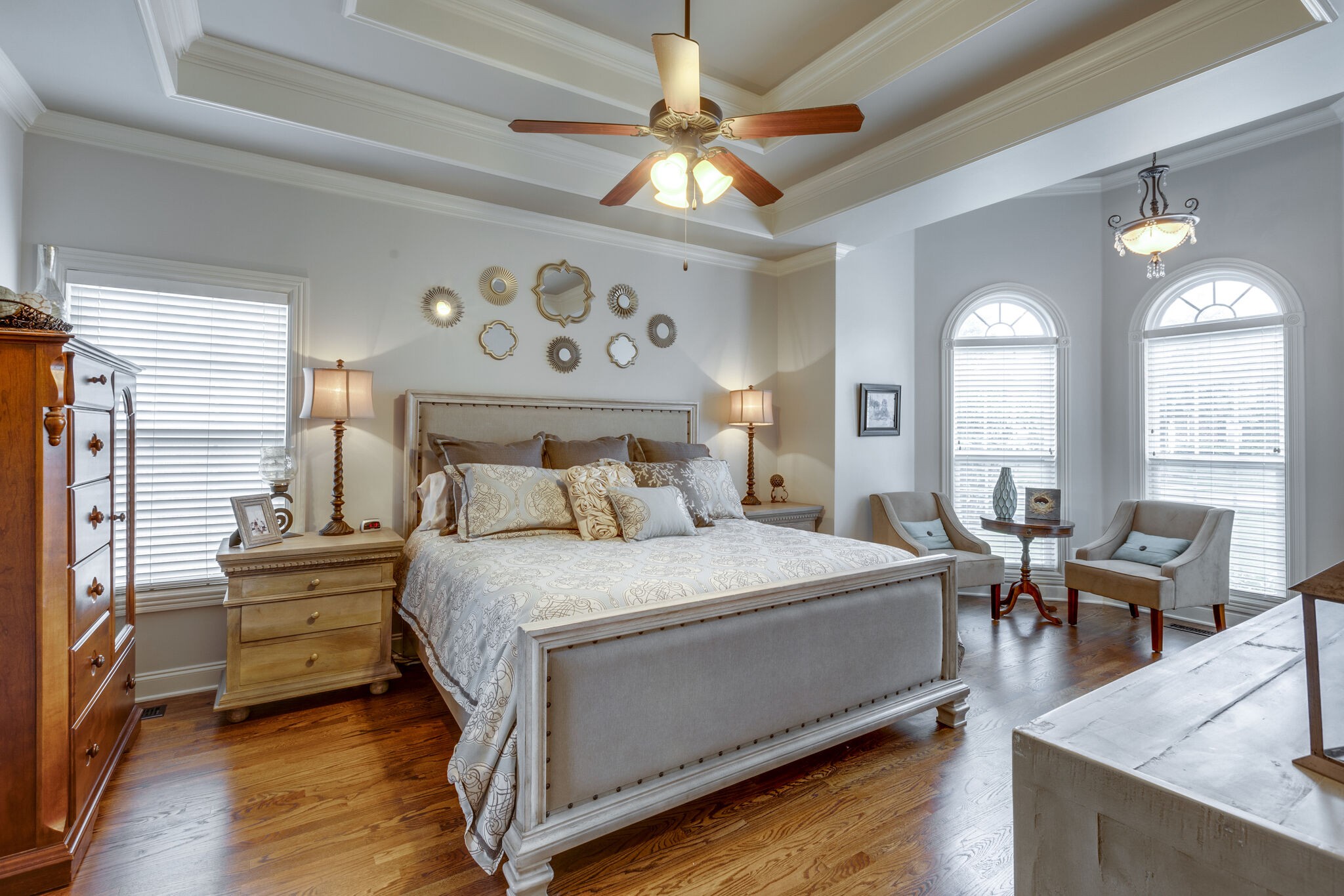 3012 Stewart Campbell Pointe Spring Hill, TN 37174 - Photo 21 of 44 a bedroom with a bed and a chandelier