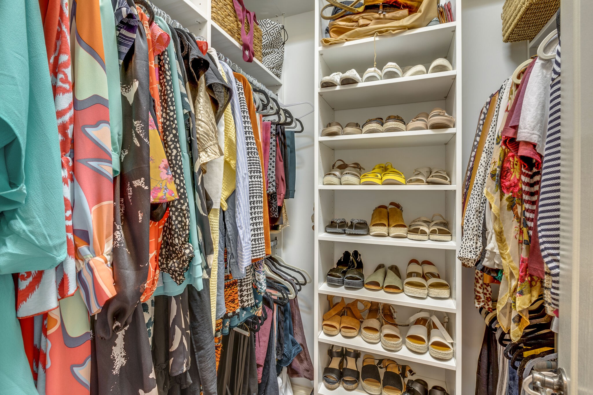 3012 Stewart Campbell Pointe Spring Hill, TN 37174 - Photo 26 of 44 a view of walk in closet with clothes and shoes