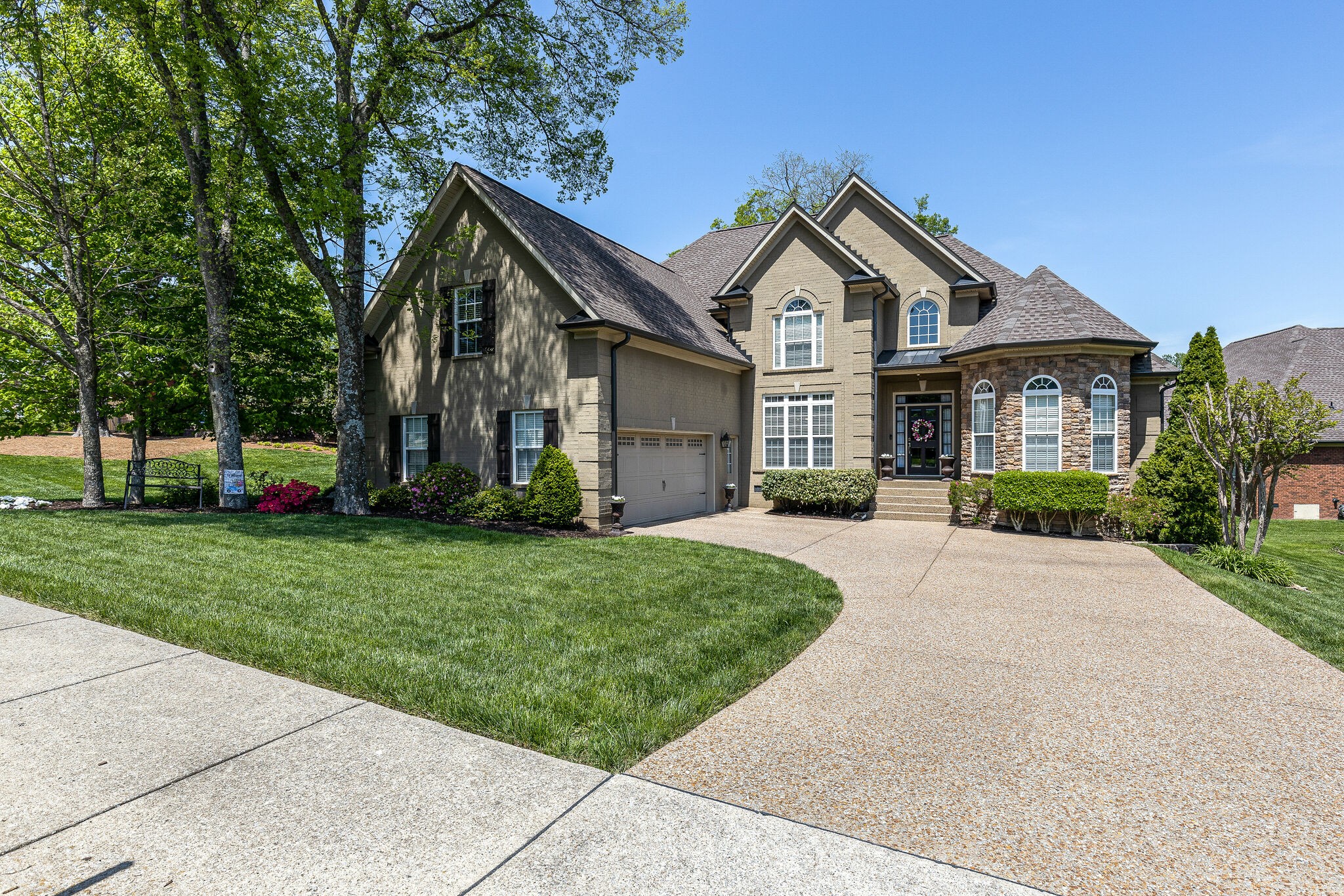 3012 Stewart Campbell Pointe Spring Hill, TN 37174 - Photo 3 of 44 a front view of house with yard and green space