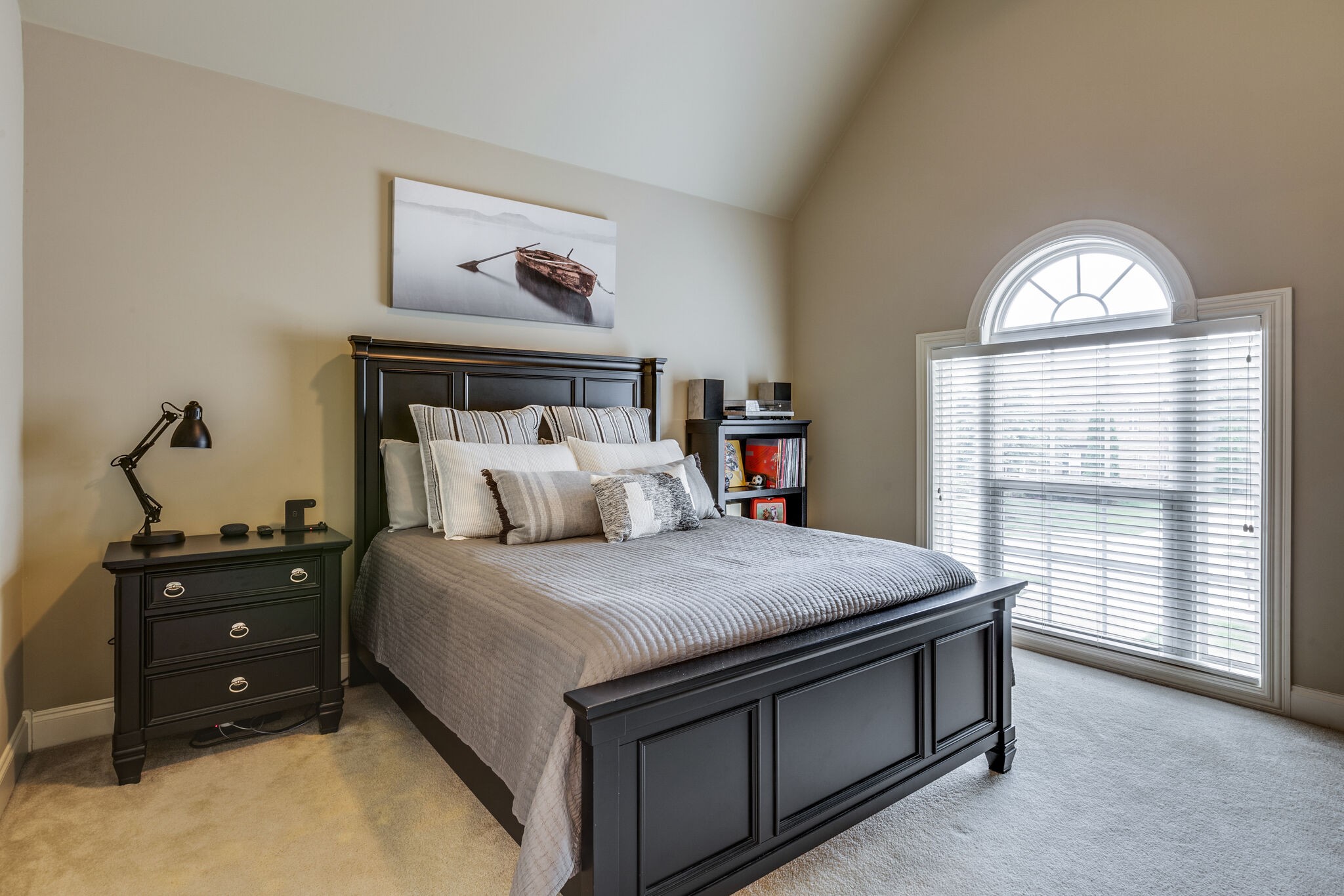 3012 Stewart Campbell Pointe Spring Hill, TN 37174 - Photo 31 of 44 a bed sitting in a bedroom next to a window