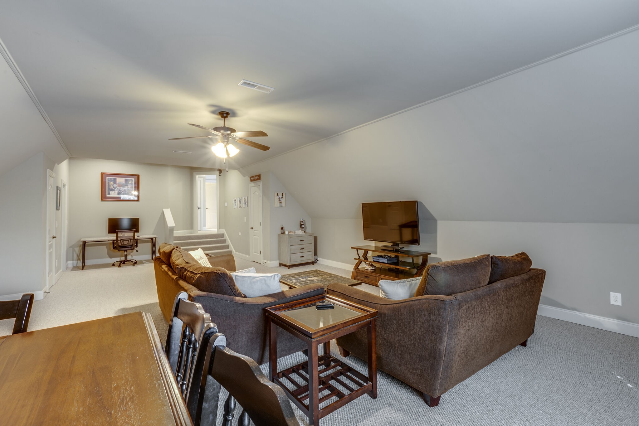 3012 Stewart Campbell Pointe Spring Hill, TN 37174 - Photo 33 of 44 a living room with furniture and a flat screen tv