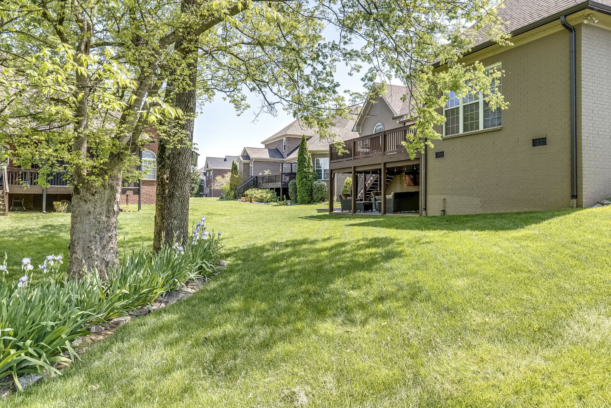 3012 Stewart Campbell Pointe Spring Hill, TN 37174 - Photo 41 of 44 a view of a house with a yard