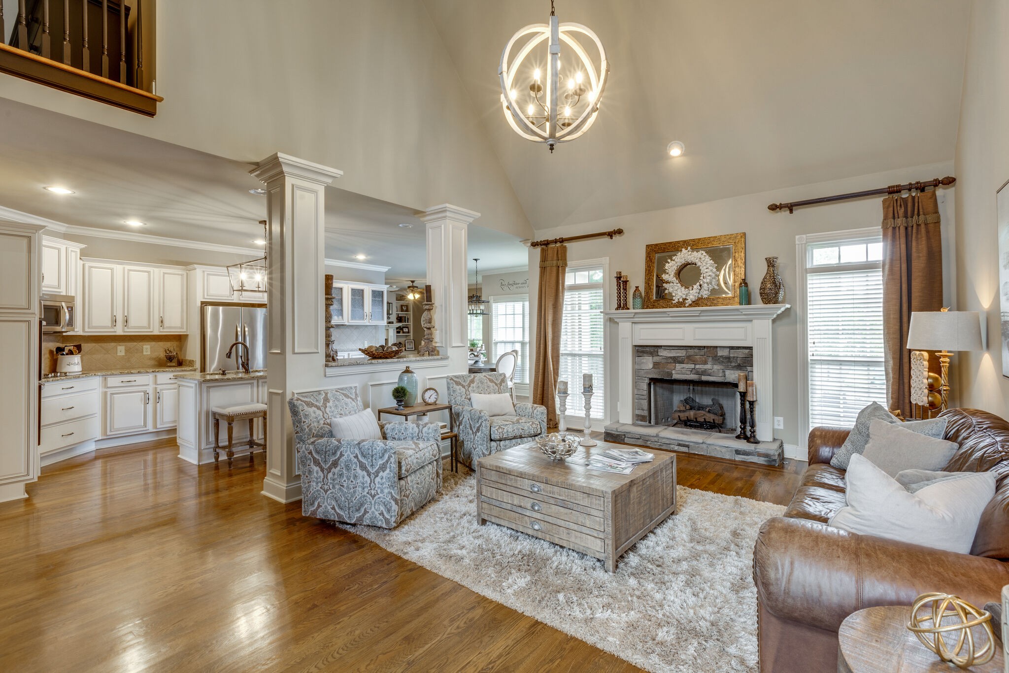 3012 Stewart Campbell Pointe Spring Hill, TN 37174 - Photo 8 of 44 a living room with furniture and a fireplace