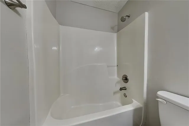 a close view of a bathtub in bathroom