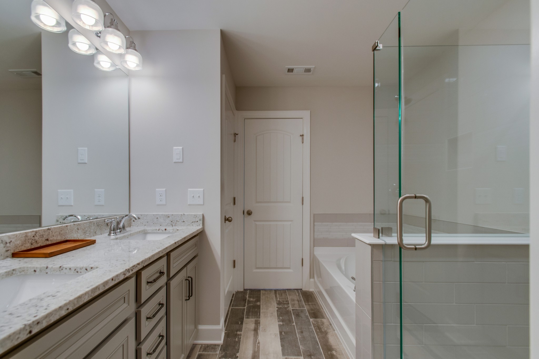 3309 Deerchase Circle Murfreesboro, TN 37129 - Photo 21 of 27 a bathroom with a sink a vanity and a mirror
