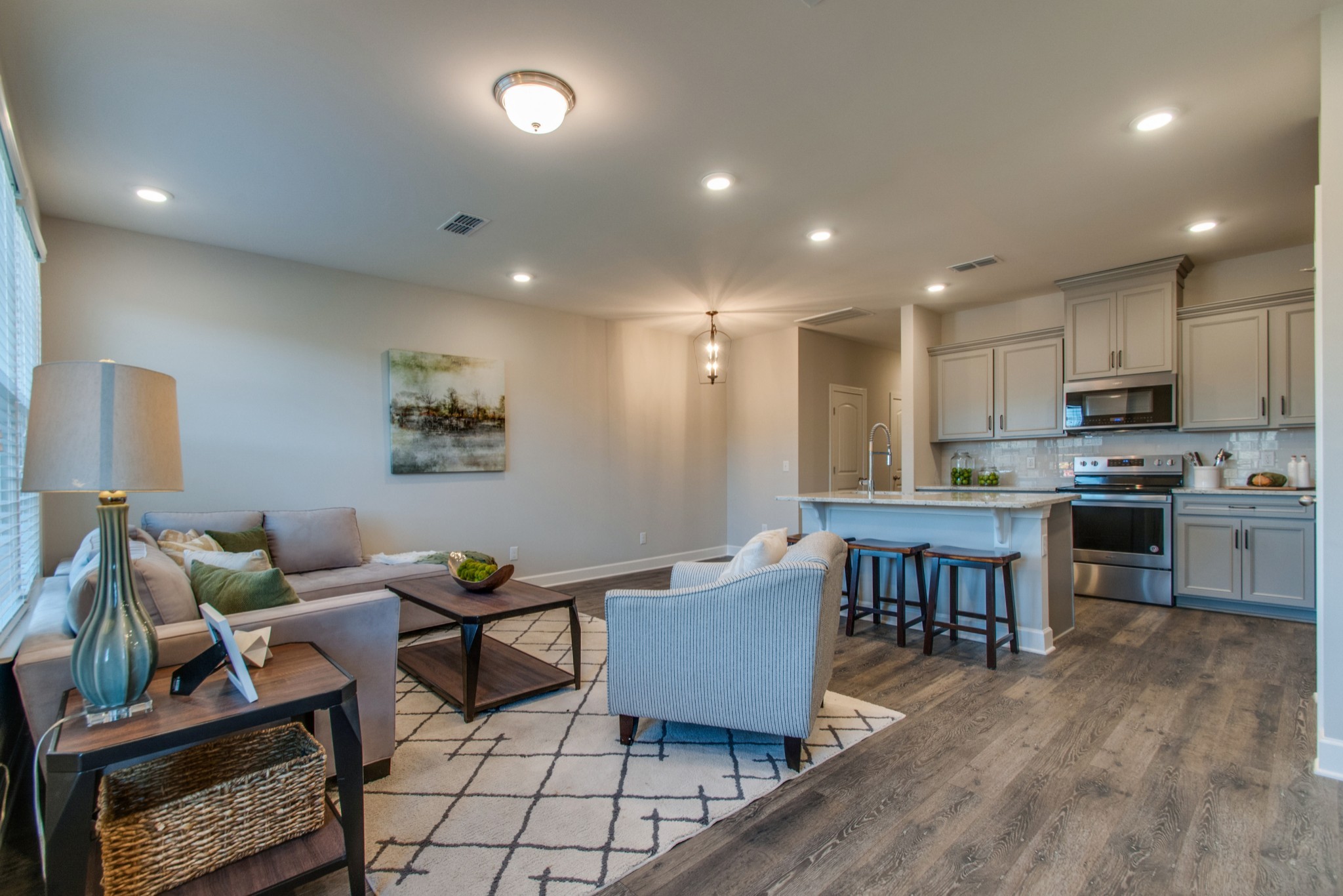 3309 Deerchase Circle Murfreesboro, TN 37129 - Photo 5 of 27 a living room with dining room and kitchen view with wooden floor
