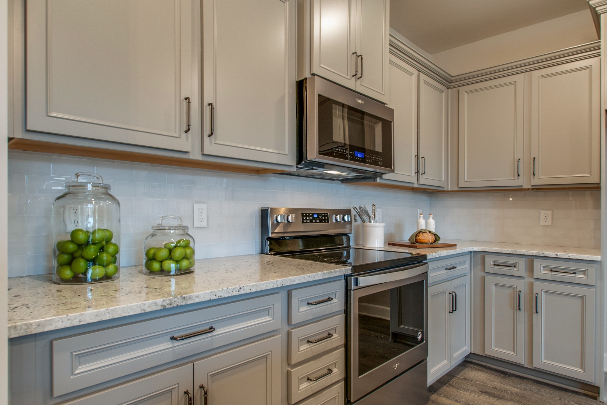 3309 Deerchase Circle Murfreesboro, TN 37129 - Photo 8 of 27 a kitchen with white cabinets and a stove