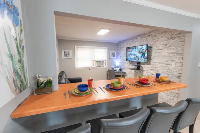 a view of a dining room and tables