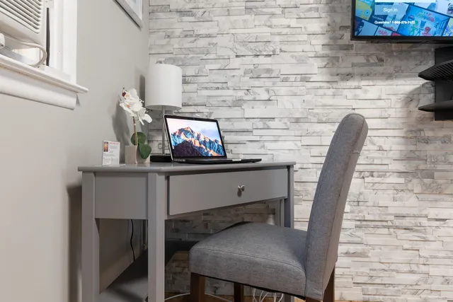 a room with a table and chairs