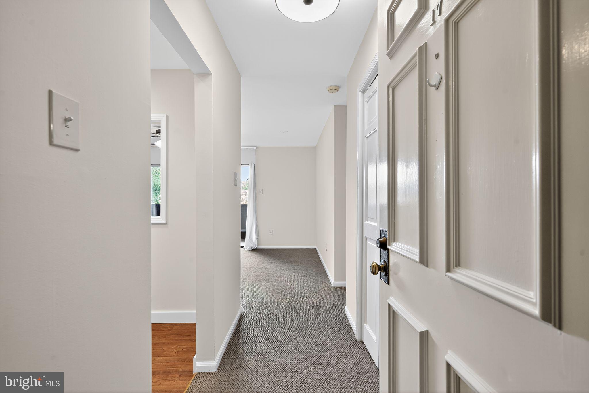 17 Haddonfield Cmns Haddonfield, NJ 08033 - Photo 18 of 37 a view of a hallway with a white walls