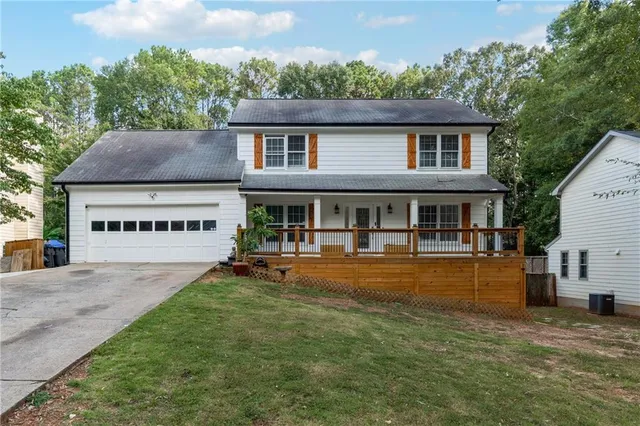 a house view with a garden space