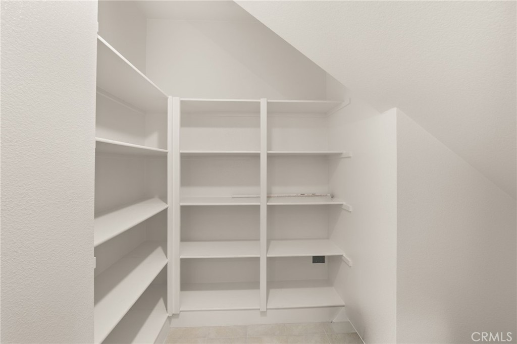 32461 Brunello Way Temecula, CA 92591 - Photo 17 of 46 a view of a room with shelf
