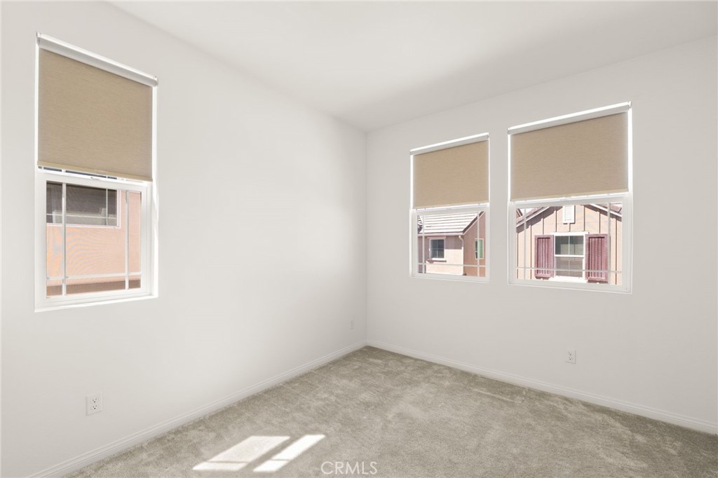 32461 Brunello Way Temecula, CA 92591 - Photo 22 of 46 an empty room with a window