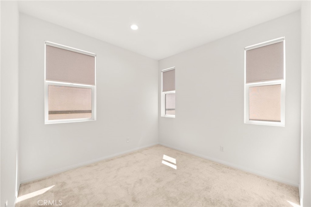 32461 Brunello Way Temecula, CA 92591 - Photo 27 of 46 an empty room with a window