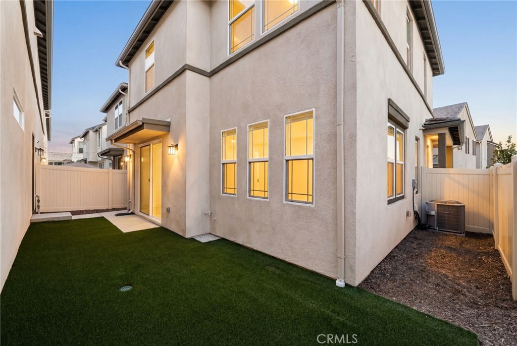 32461 Brunello Way Temecula, CA 92591 - Photo 32 of 46 a view of an house with backyard and porch