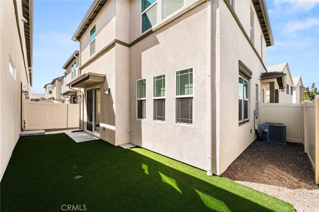 32461 Brunello Way Temecula, CA 92591 - Photo 34 of 46 a view of an house with backyard and porch