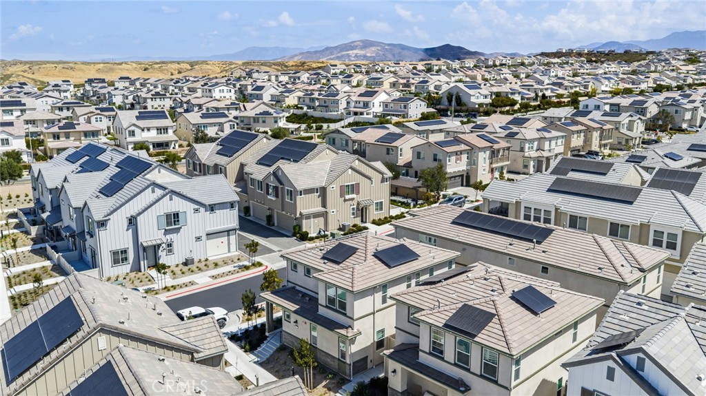 32461 Brunello Way Temecula, CA 92591 - Photo 38 of 46 an aerial view of a residential apartment building with a city view
