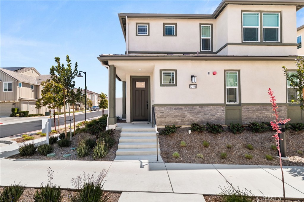 32461 Brunello Way Temecula, CA 92591 - Photo 4 of 46 a front view of a house with a yard