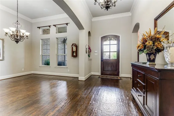 a view of a livingroom with a furniture chandelier