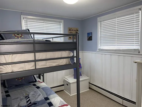 a bathroom with a sink and a window
