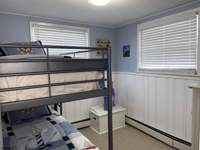 a bathroom with a sink and a window