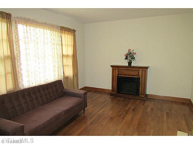 6075 Maple Springs Road Seagrove, NC 27341 - Photo 2 of 12 Living Room. Electric FP Remains