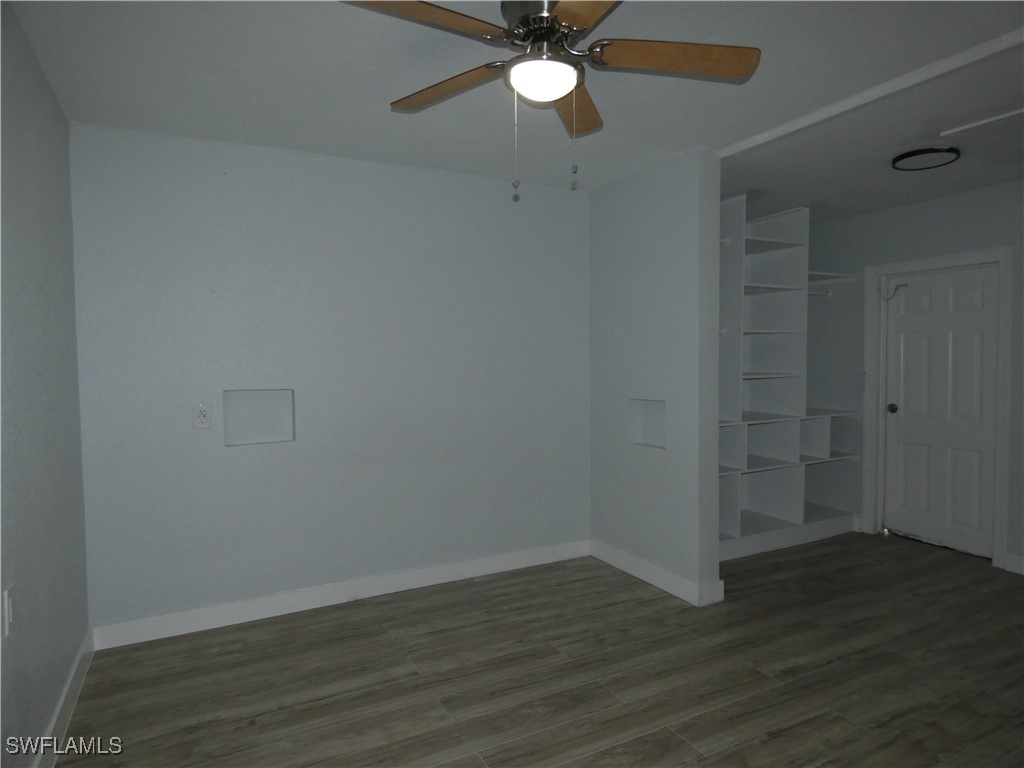 3817 Pearl Street Fort Myers, FL 33916 - Photo 12 of 21 wooden floor in an empty room