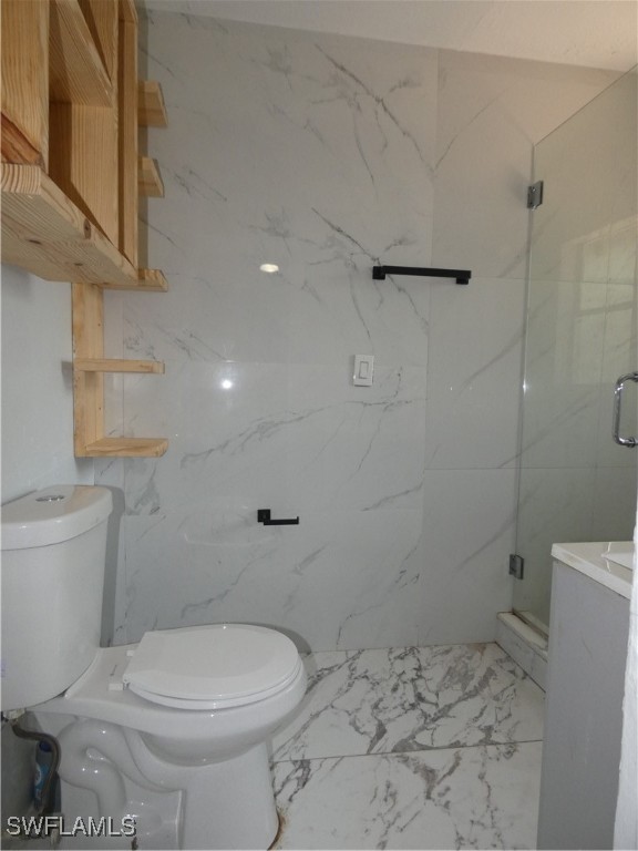 3817 Pearl Street Fort Myers, FL 33916 - Photo 15 of 21 a bathroom with a toilet and a shower