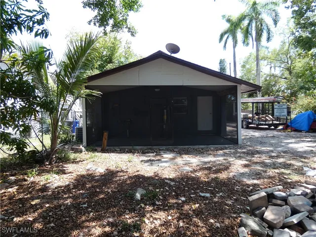a house with trees in front of it