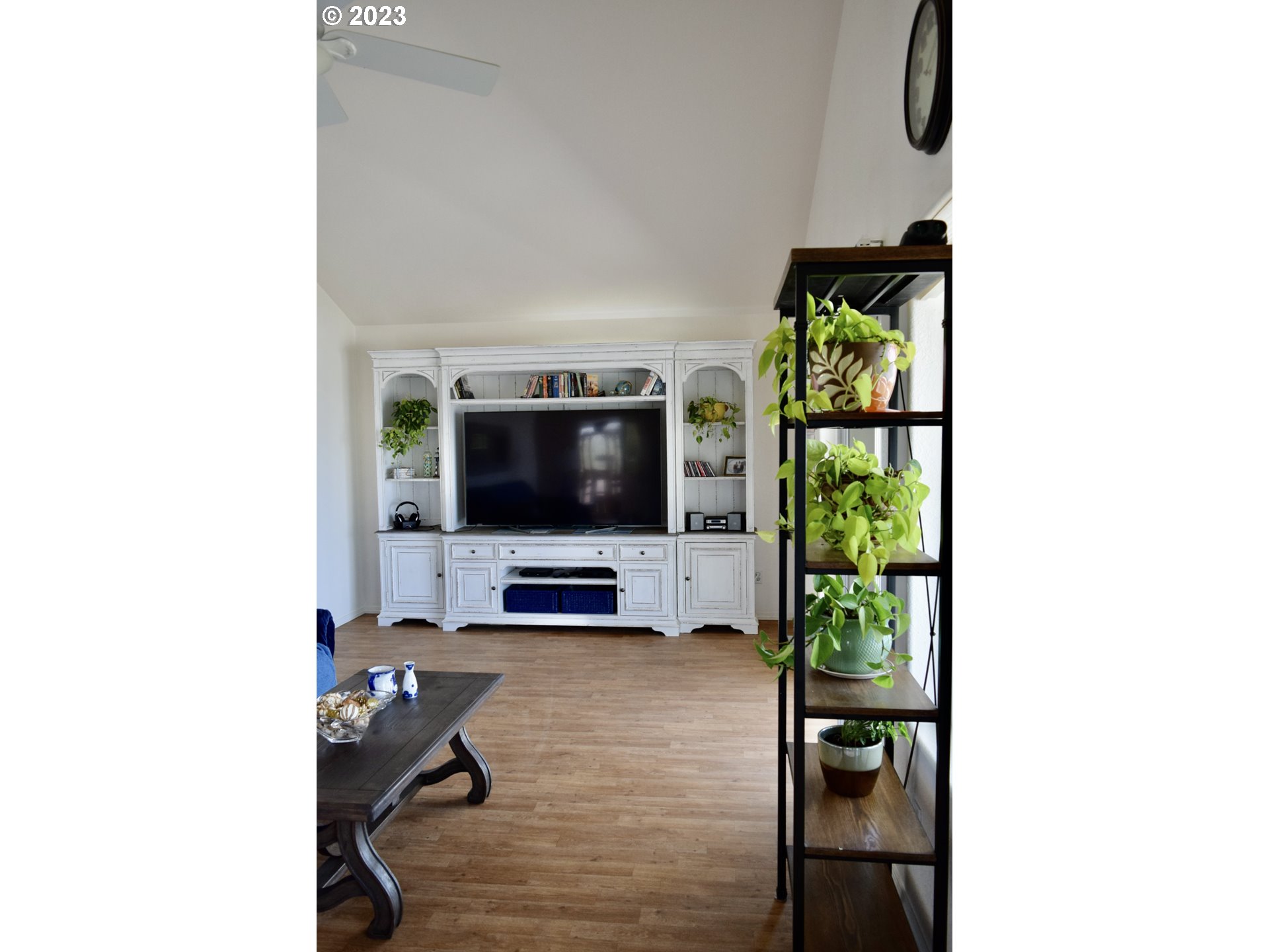 33074 Nesika Road Gold Beach, OR 97444 - Photo 13 of 40 a living room with furniture and a flat screen tv