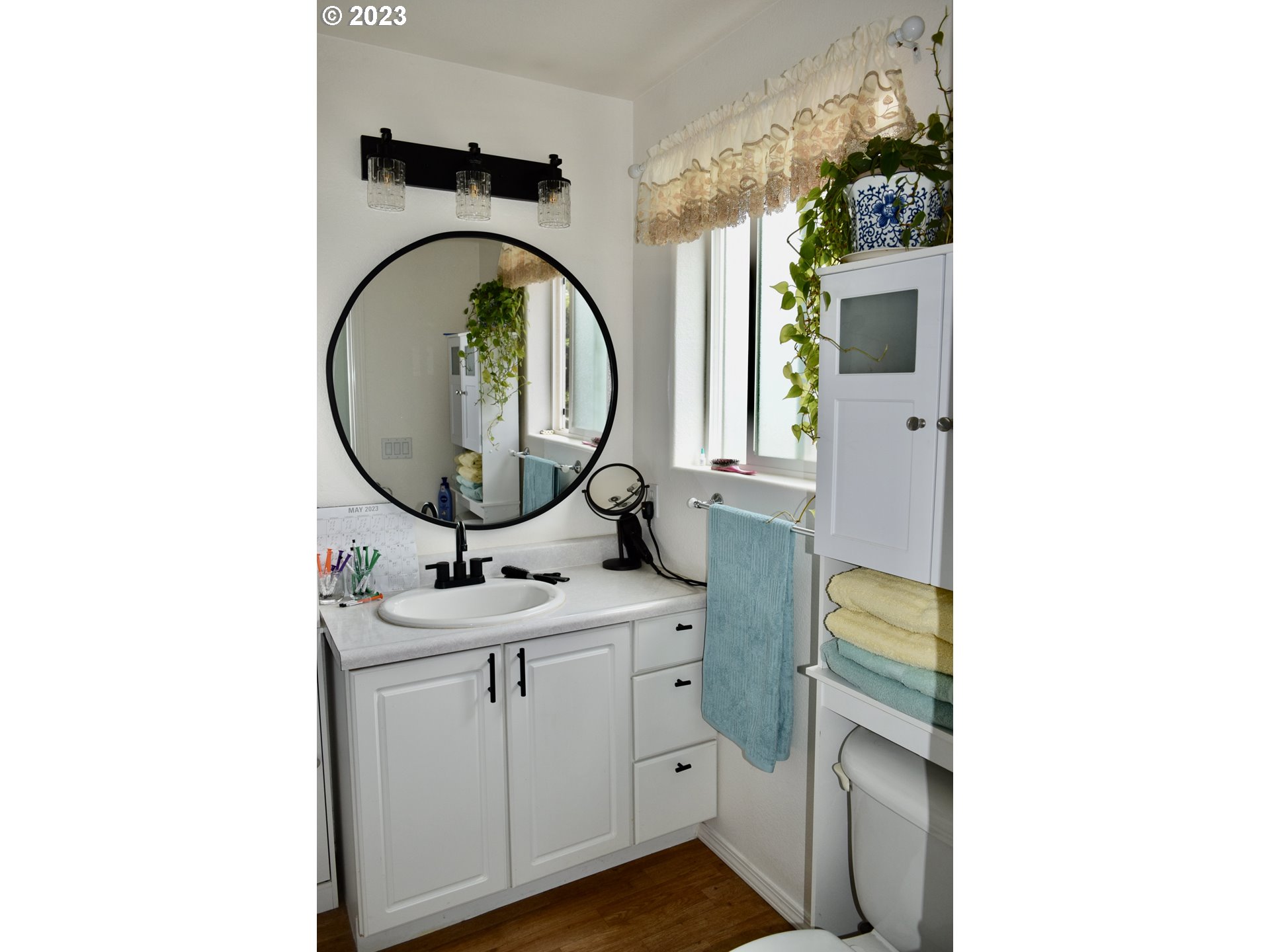 33074 Nesika Road Gold Beach, OR 97444 - Photo 22 of 40 a bathroom with a sink and a mirror
