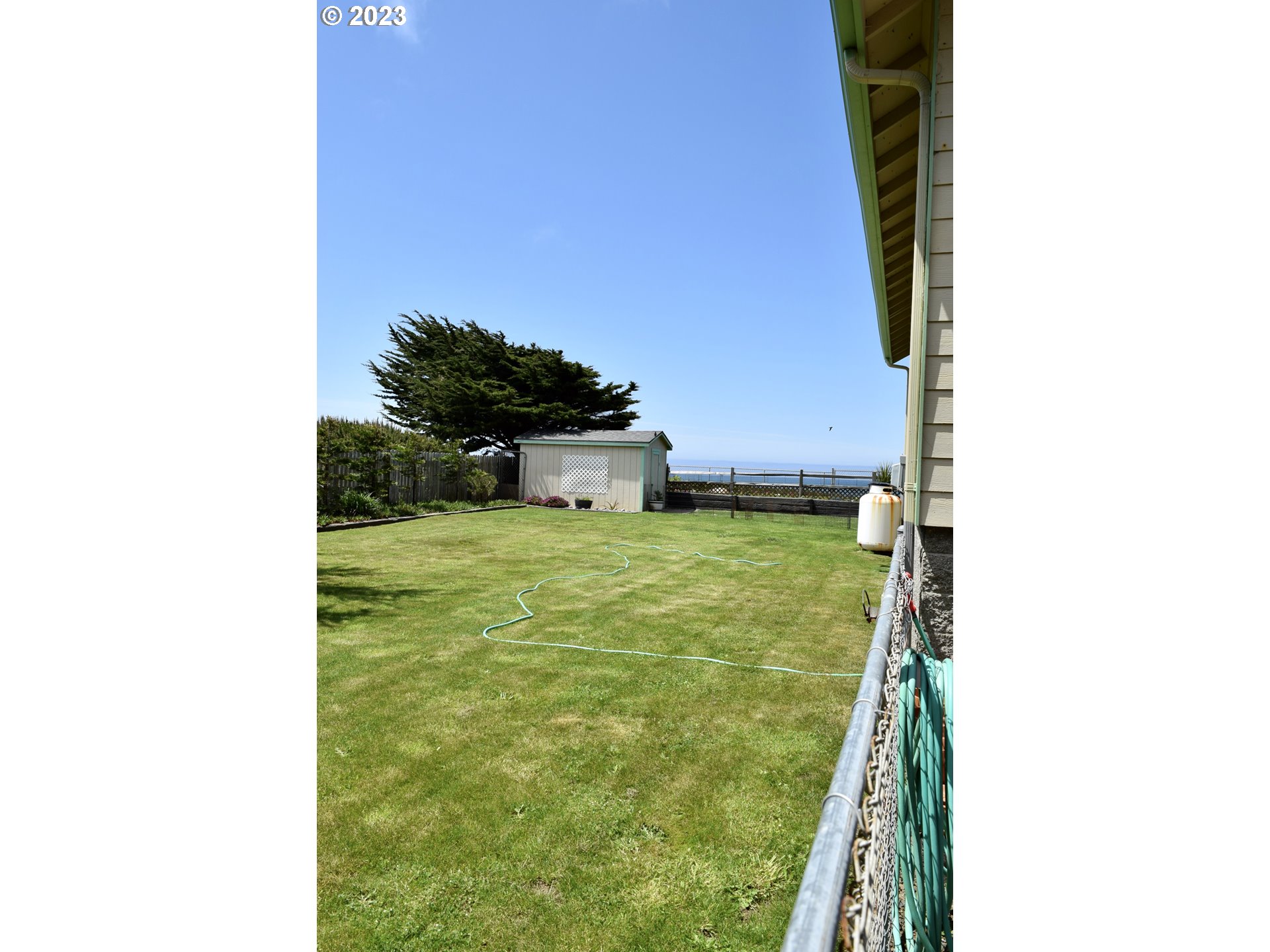 33074 Nesika Road Gold Beach, OR 97444 - Photo 25 of 40 a bathroom with a sink and mirror