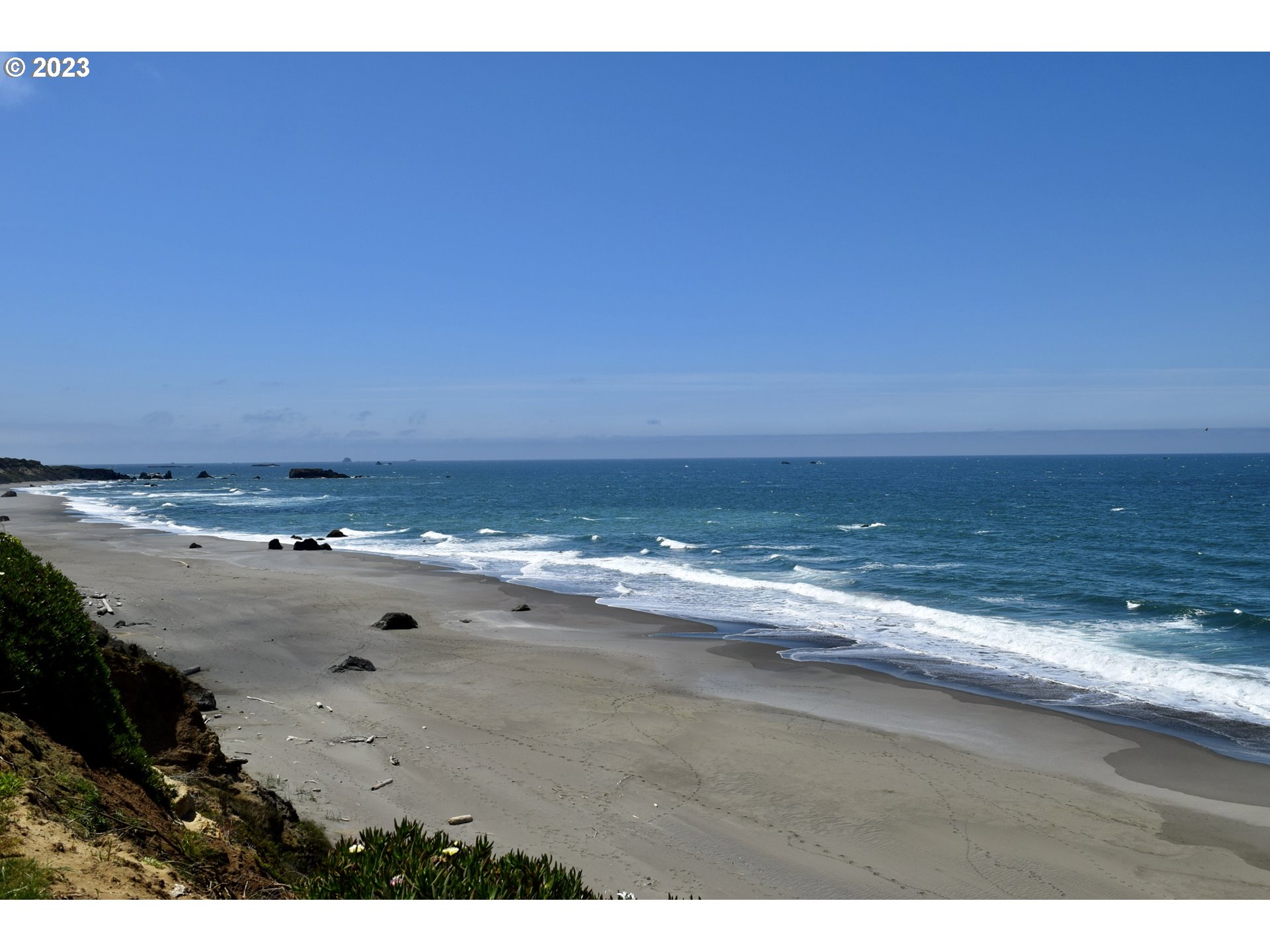 33074 Nesika Road Gold Beach, OR 97444 - Photo 3 of 40 a view of an ocean beach