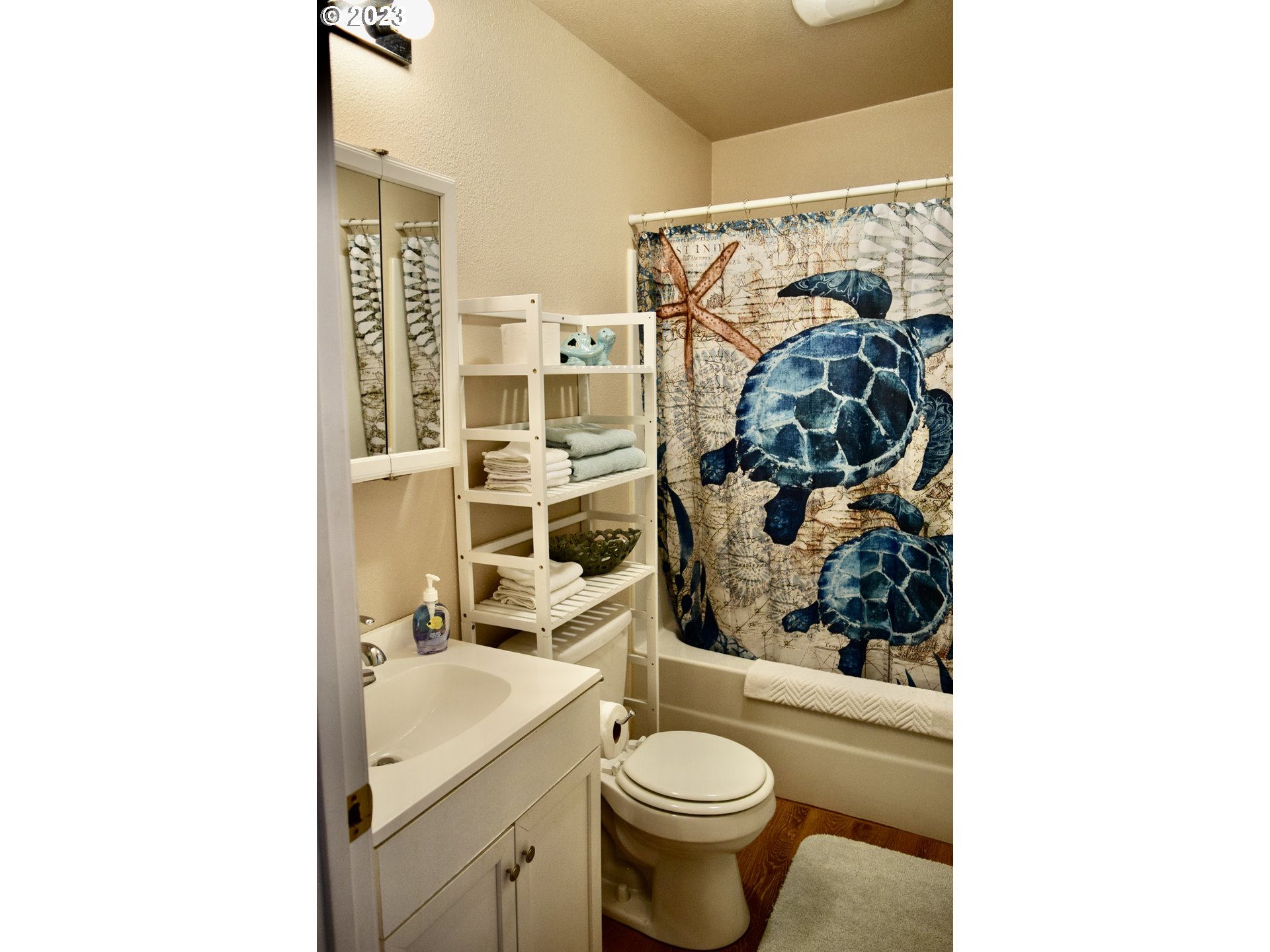 33074 Nesika Road Gold Beach, OR 97444 - Photo 38 of 40 a bathroom with a sink toilet and shower