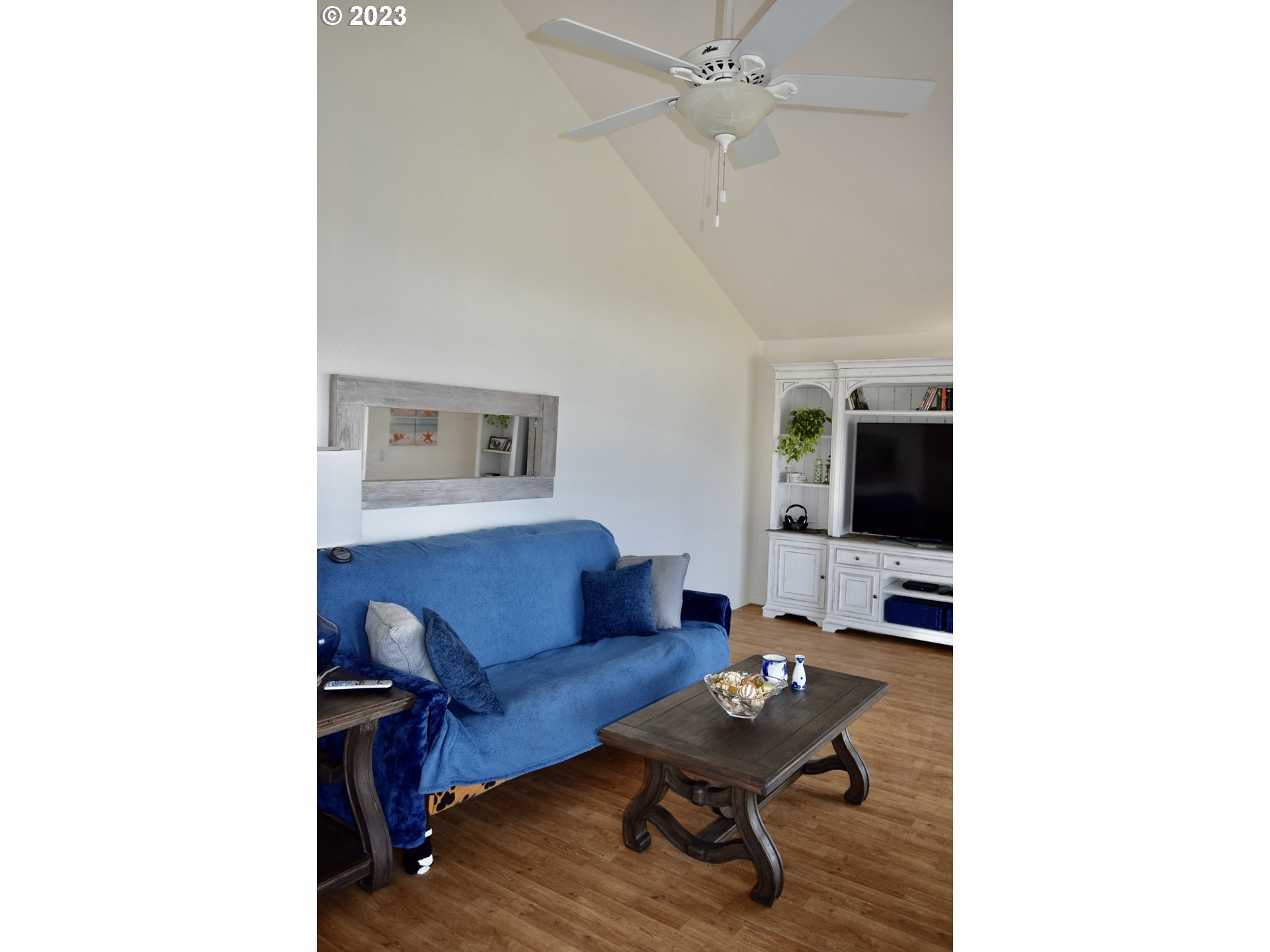 33074 Nesika Road Gold Beach, OR 97444 - Photo 10 of 40 a living room with furniture and a window