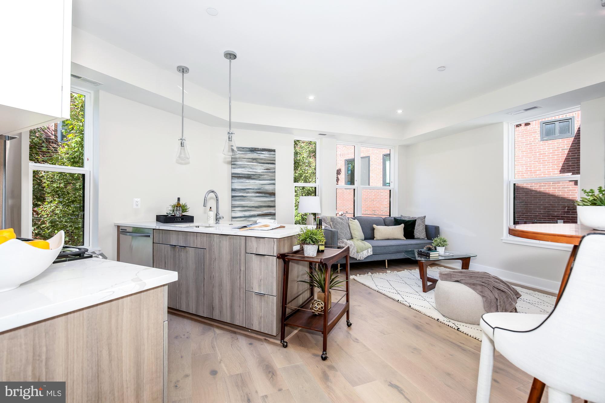 1421 Spring Road Northwest, Unit 203 Washington, DC 20010 - Photo 13 of 13 & to Unit 203, an amazing open floor plan