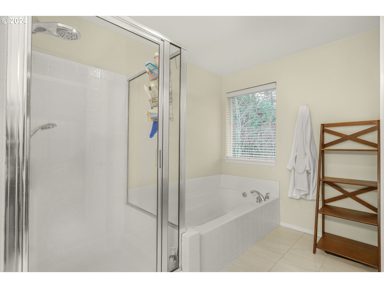 4412 Northwest 12th Avenue Camas, WA 98607 - Photo 17 of 33 a bathroom with a bathtub and a shower