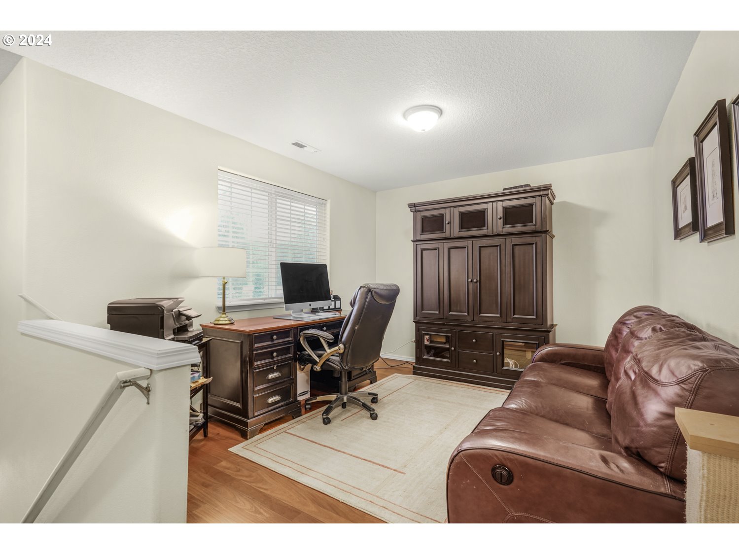 4412 Northwest 12th Avenue Camas, WA 98607 - Photo 21 of 33 a living room with furniture a computer on the desk and chair