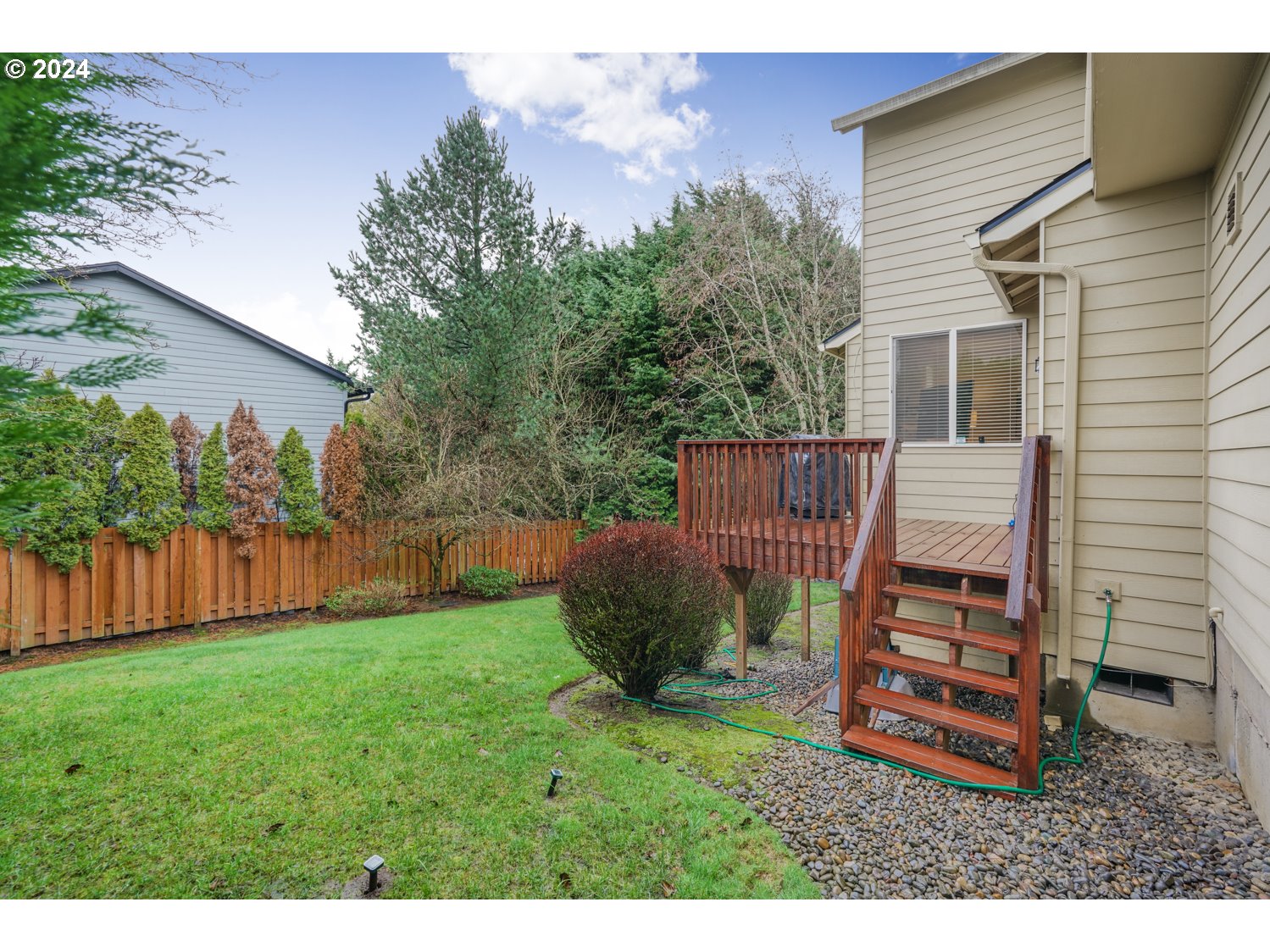 4412 Northwest 12th Avenue Camas, WA 98607 - Photo 27 of 33 a backyard of a house with lots of green space