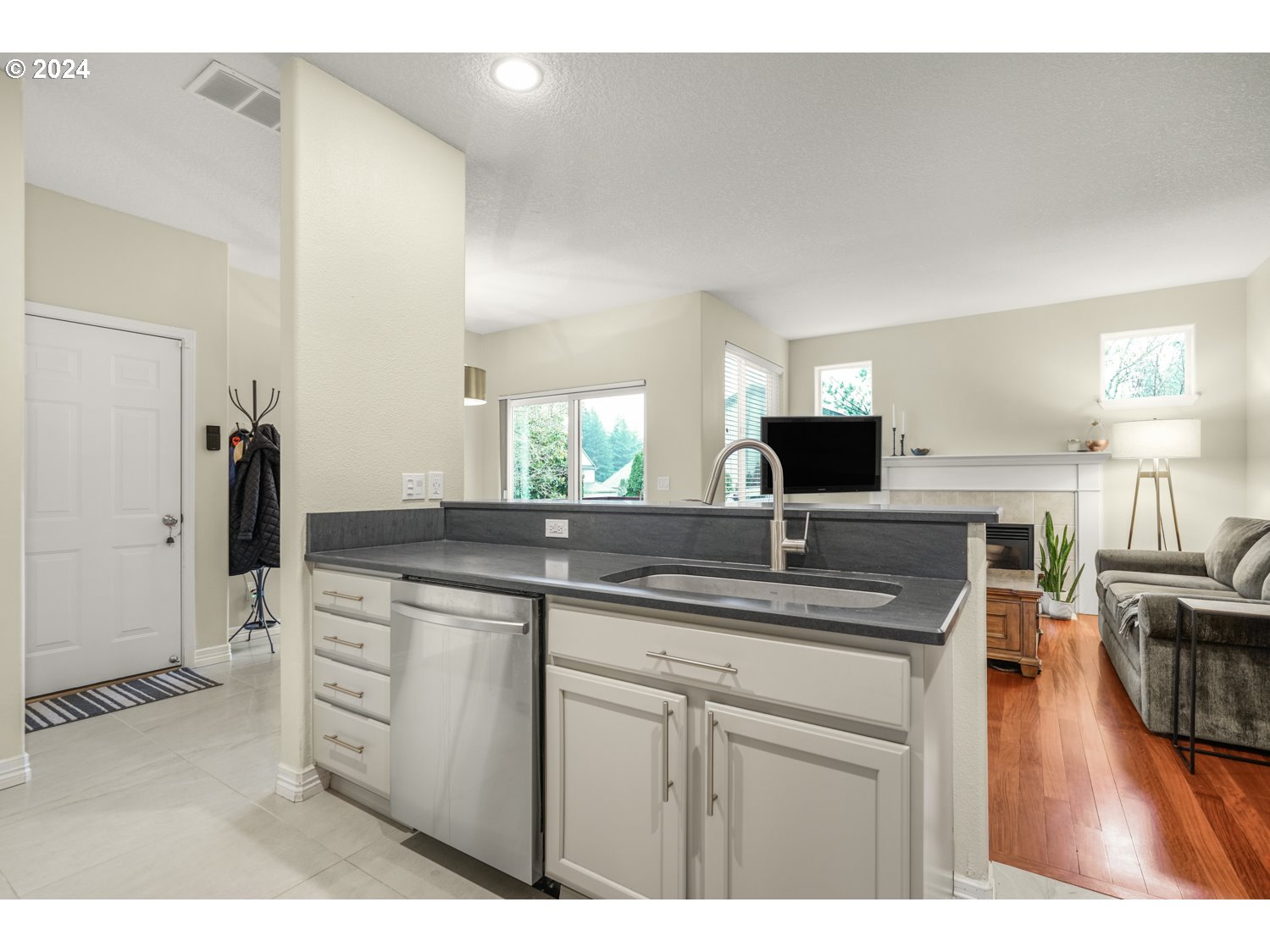 4412 Northwest 12th Avenue Camas, WA 98607 - Photo 9 of 33 a kitchen with a sink and cabinets